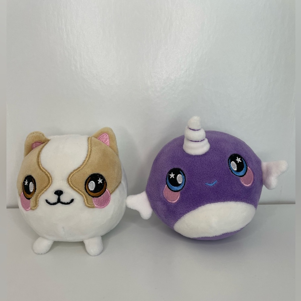 2 Squeezamals Nellie the Narwhal and Dax the Corgi plush toys